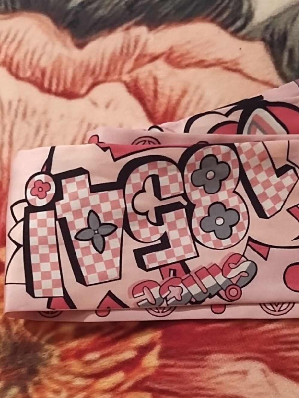 Pink Graphic Headband with Floral Motifs